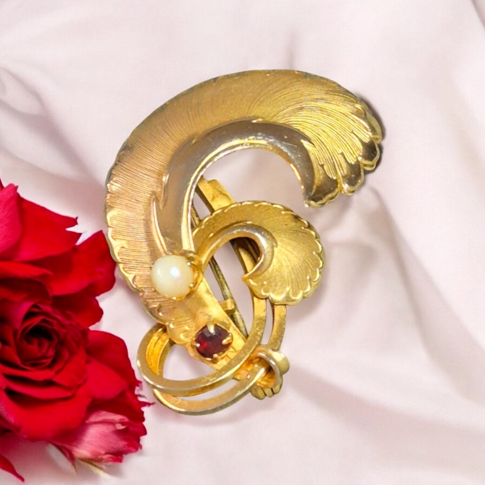 Gold tone faux pearl & small garnet Brooch wit Curved Design and Textured Finish